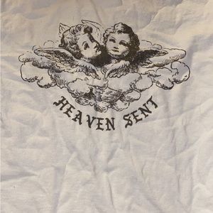 Brandy Melville Heaven Sent cropped tee. Never worn w/ tags. ONE SIZE
